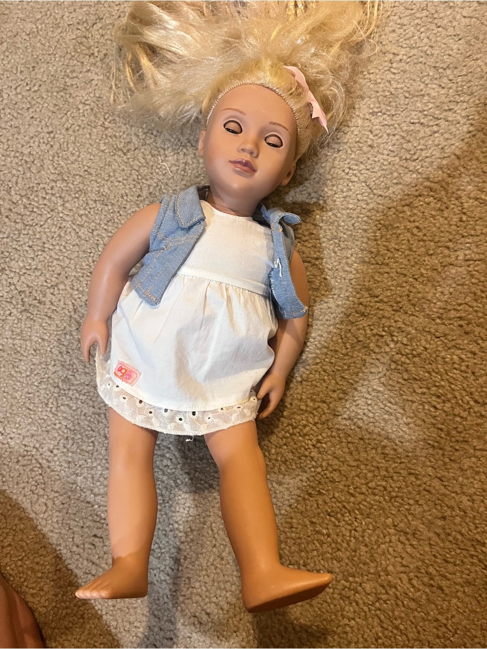 Our generation Blonde Doll with White Dress and Denim Vest grow hair